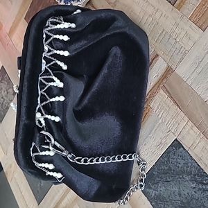 Black velvet clutch bag